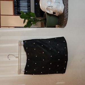 Studded leather skirt.
